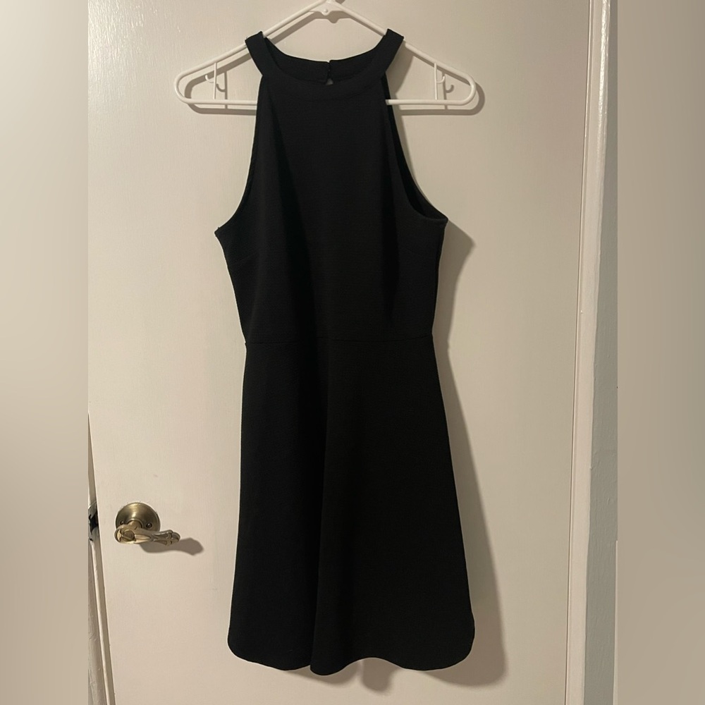 Woman’s papaya dress